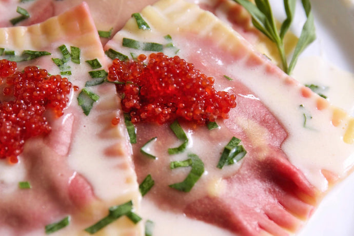 Beet & Ricotta Ravioli with Tarragon Cream Sauce & Saffron Whitefish