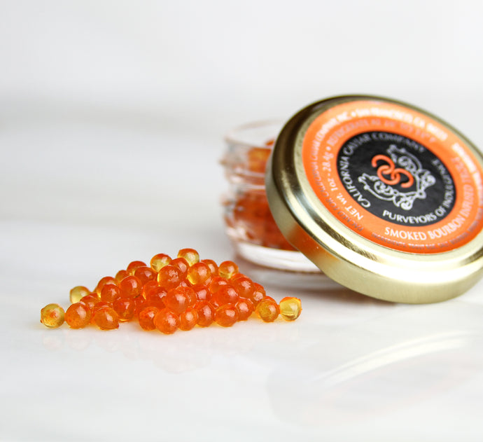 Bourbon Infused Trout Roe - The combination of bourbon with hints of smoke and caramel and the sweetness of trout roe is a perfect match. This caviar can stand up to any grilled or smoked fish.
