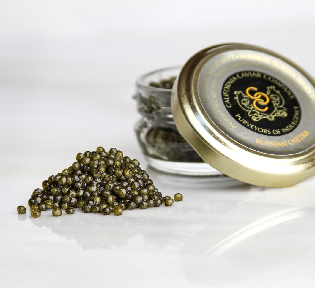 Golden Russian Ostera - Our sustainably farmed imported Russian Osetra caviar is best served simply — on a soft blini, lightly toasted brioche or straight on a pearl spoon along side a cold glass of brut champagne.